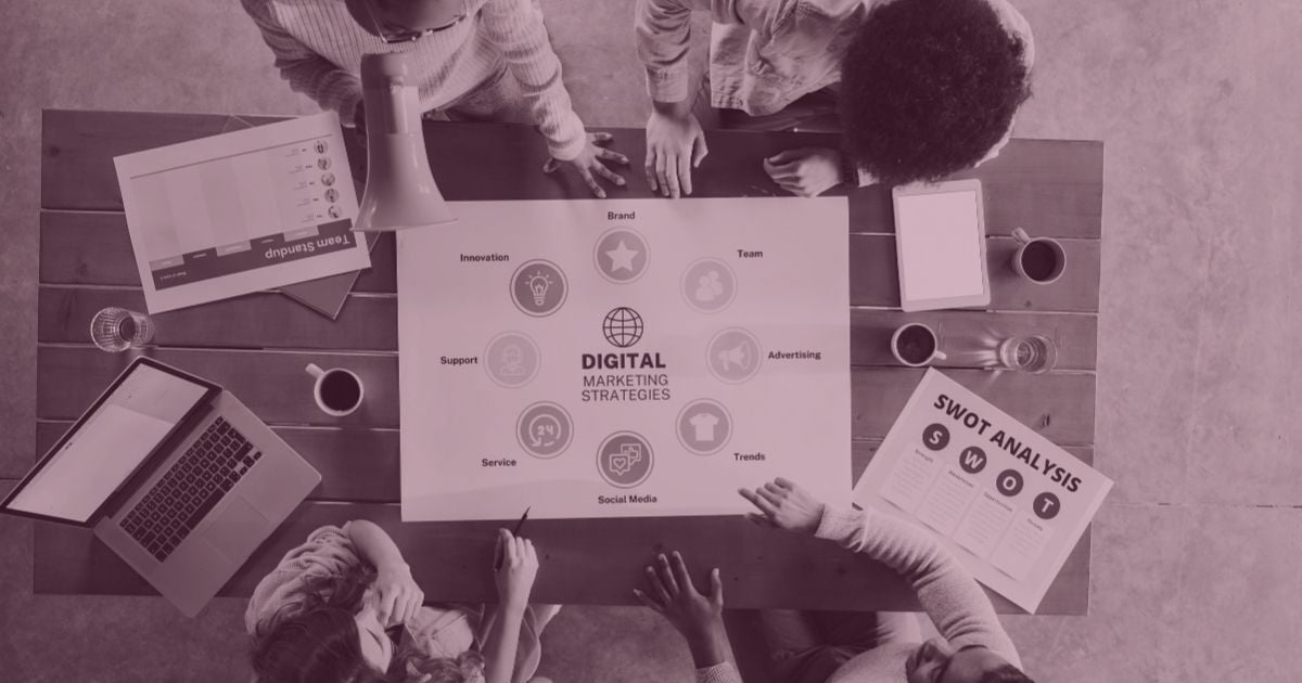 Marketing team collaborating on digital marketing strategy and planning initiatives to improve lead generation and pipeline growth.