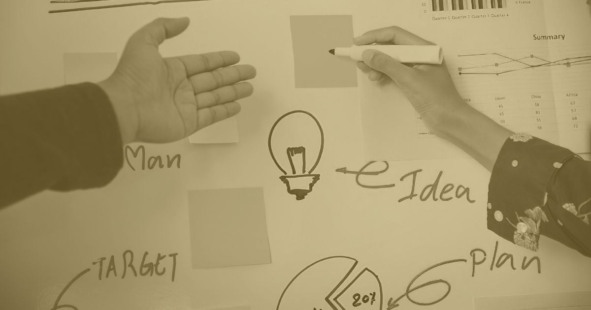 Team developing a customer acquisition strategy