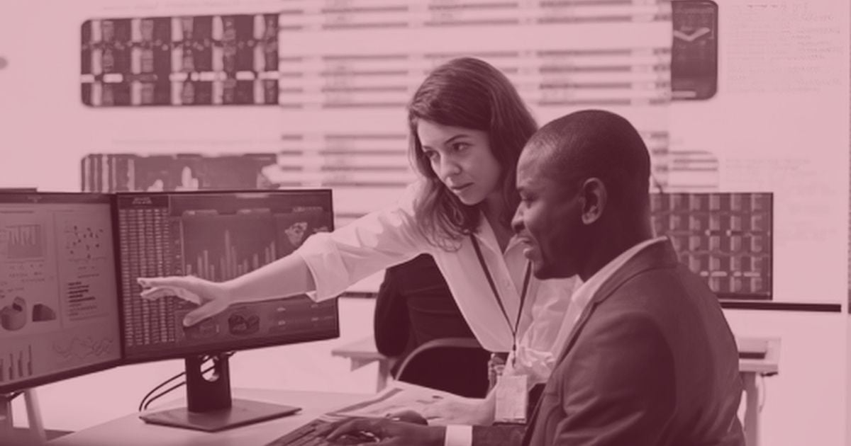 Marketing professionals analyzing data to improve a lead generation strategy